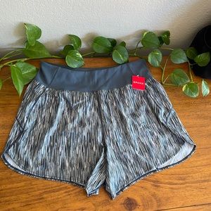 Brand new SPANX athletic shorts size large.